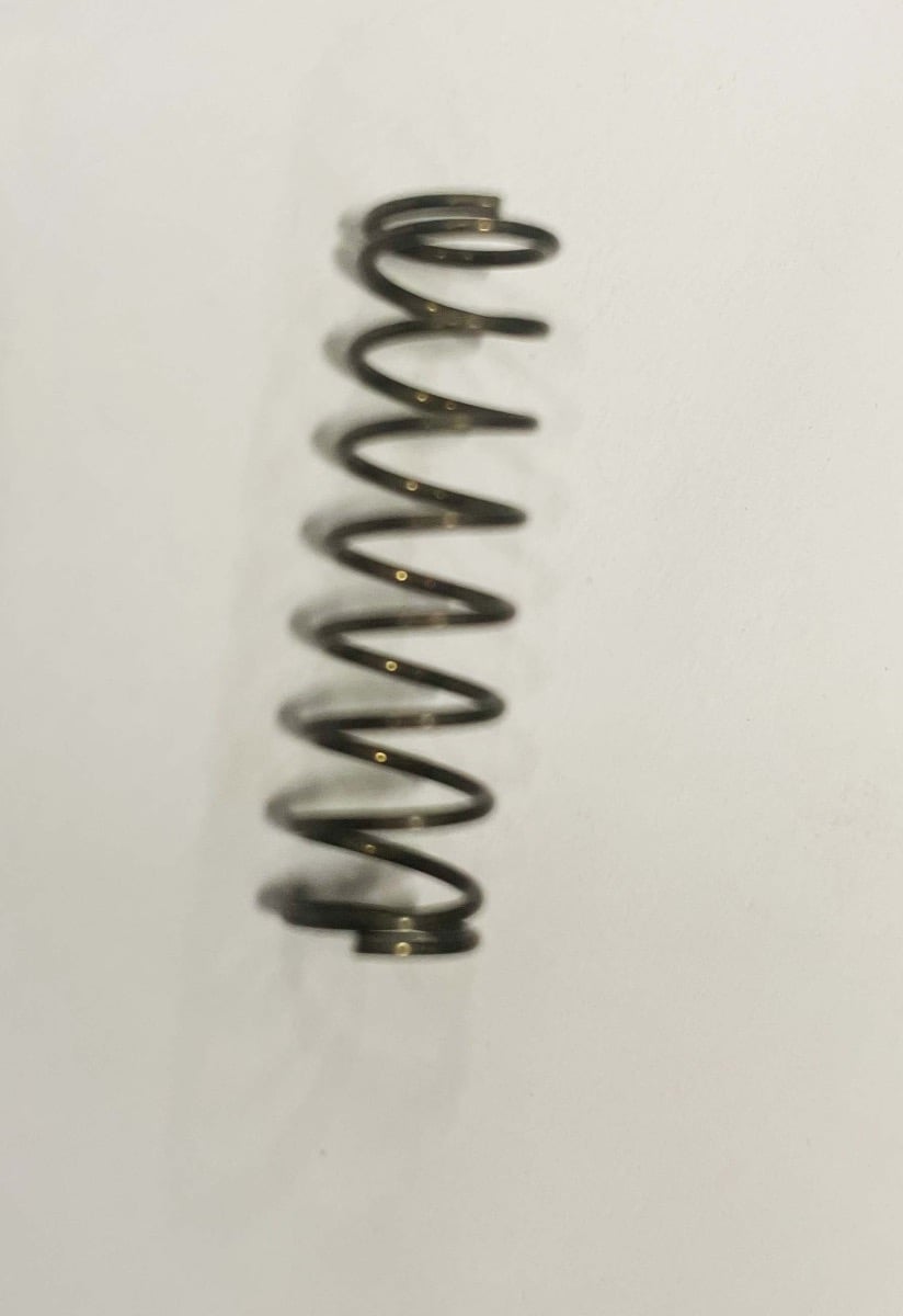 KWA TK.45 Magazine Catch Spring, Left (Part 1047)
